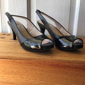 Black open toe shoe, used